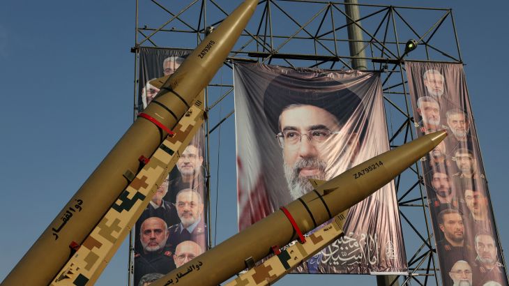 Iranian missiles are displayed next to a banner with a picture of Iran's Supreme Leader Mojtaba Khamenei, on a street in Tehran, Iran, September 27, 2026.