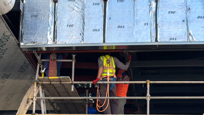 Construction workers at the station site